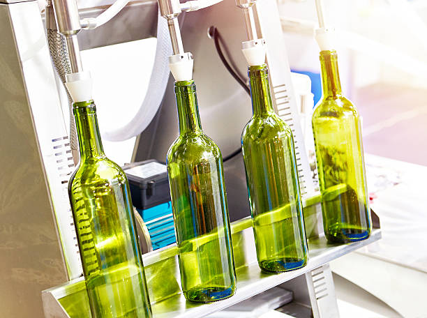 istock Bottles on filling machine for beverages 2229726818
