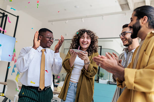 istock Coworkers Celebrating a Colleague’s Birthday at Work 2229728694