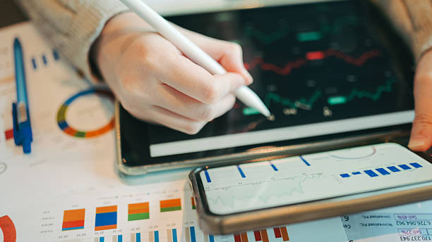 istock gen z young female investor using smartphone in modern setting, representing digital finance skills and future financial leadership next-generation women investors using ai tools 2229729078