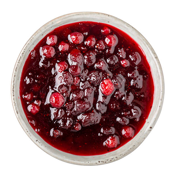 istock Cranberry jam in gray bowl isolated on white background. Top view. 2229730254