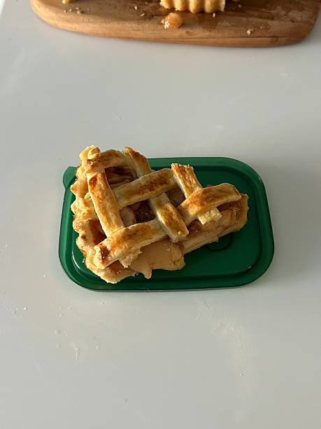 Homemade Apple Pie with fresh apples on white kitchen table, top view, flat lay. Thanksgiving traditional dessert, Thanksgiving tart preparation, autumn bakery. Crispy weather sweets. Recipe