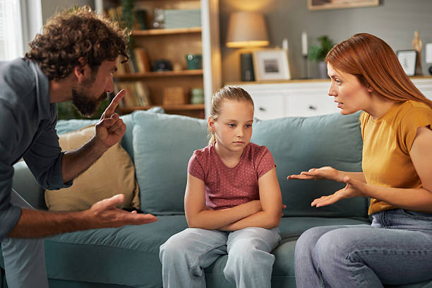 istock Parents scolding their elementary age daughter at home 2229732853