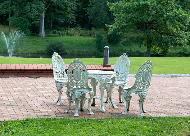 White garden furniture in the park .