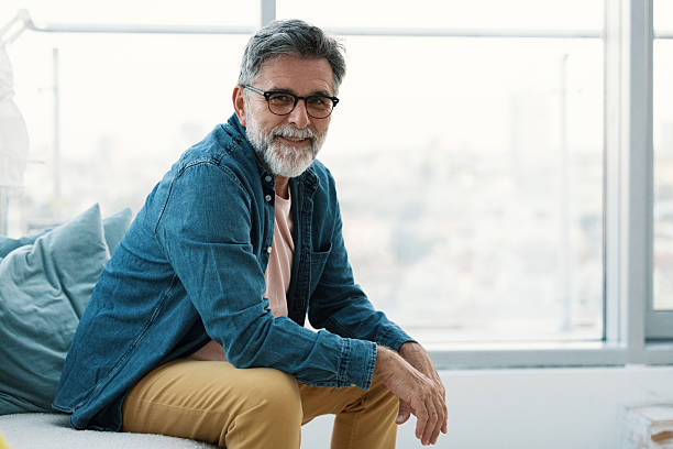 istock Happy mature man smiling into camera 2229735456