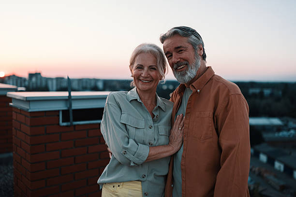 istock Senior couple smiling at sunset 2229735734