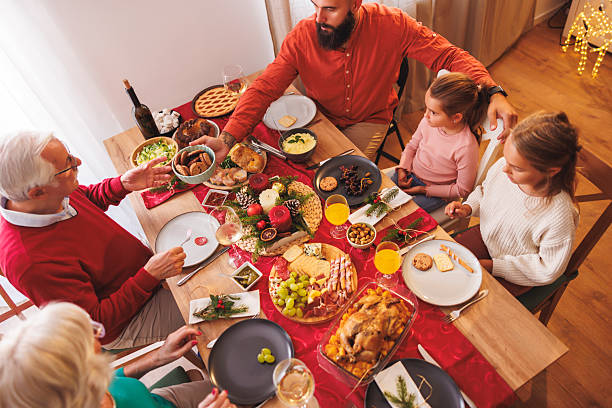 istock Multi-generation family having Christmas dinner together at home 2229737325