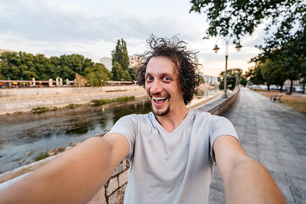 istock Mid-Adult Man Taking Selfies On The Quayside 2229740887