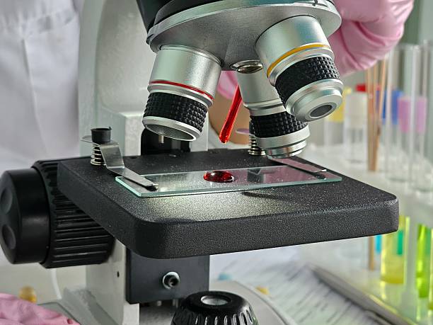 istock Microscope showcasing a specimen on a glass slide in a laboratory 2229741475