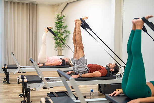 istock Caucasian Male Engaging in Reformer Pilates Exercise 2229742182
