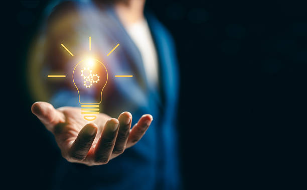 istock Businessman hands showing light bulb for thinking new idea concept. Innovative technology with innovation. Inspiration of ideas for sustainable business development and communication concepts 2229743130