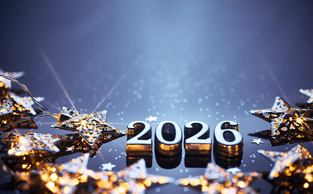 istock Elegant 2026 Holiday Greeting with Illuminated Stars and Blue Reflective Surface 2229743934