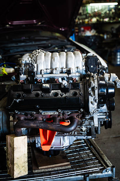 Close up view of a car engine in repair shop