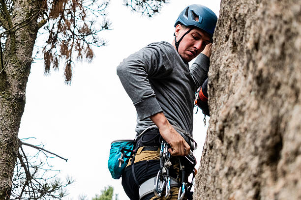 istock Climber climbing mountain in Patagonia, Argentina 2229750315