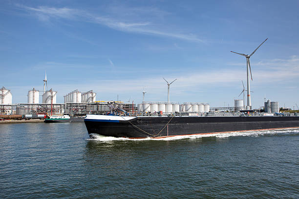 Port of Antwerp - large storage tanks, refinery and ships