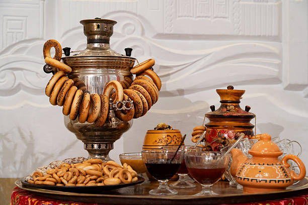 tea table with samovar, kettle, bagels and gingerbread, sweet pastries