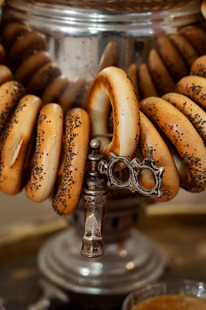 istock tea table with samovar, kettle, bagels and gingerbread, sweet pastries 2229763587