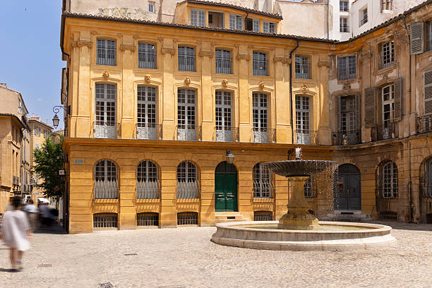 Square with fountain and historic buildings
