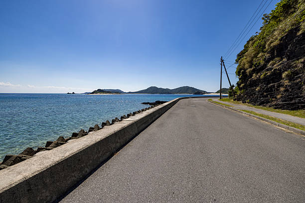 coastal road around zamami island, kerama islands, okinawa islands, japan.