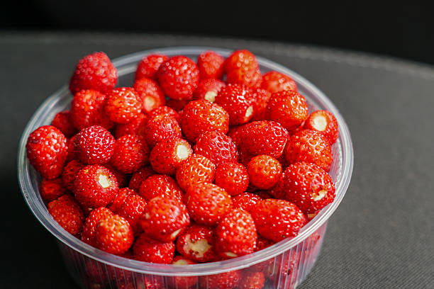 bowl of strawberries isolated on white background