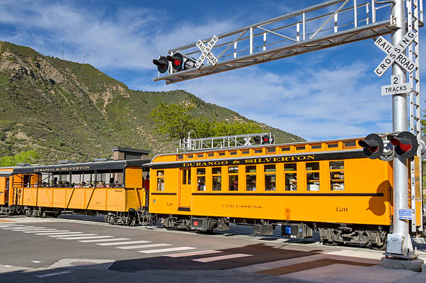 Historic Narrow Gauge Consolidation Type Steam Locomotive 40 on a Tall Bridge with Mountains in the Background