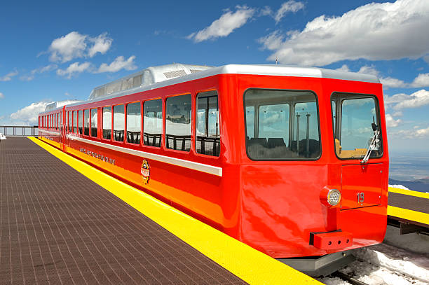 Manitou Springs, Colorado, USA - 21 May 2025: Train on the Manitou and Pike's Peak Cog railway at the station at the summit of the Pike's Peak mountain