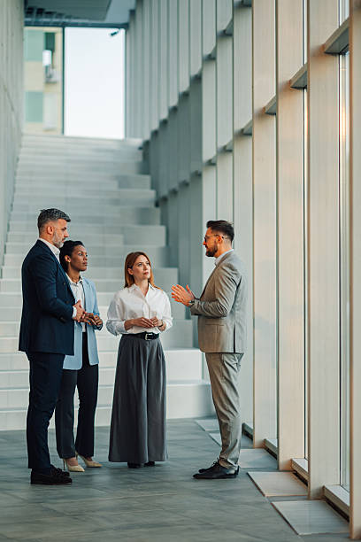 istock Business team discussing strategy in modern office building 2229783798