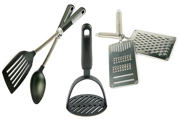 Grater, shredder, potato masher and large spoon isolated on white background. Collage.