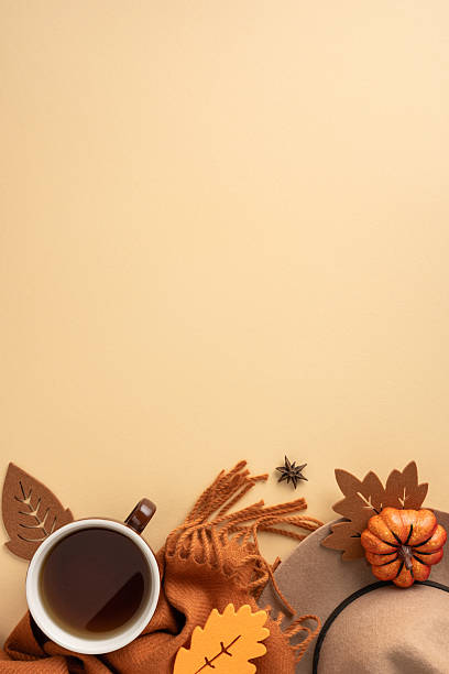 istock Flat lay vertical showcasing autumn-themed elements including a coffee cup, scarf, pumpkins, and leaves for seasonal warmth 2229790967
