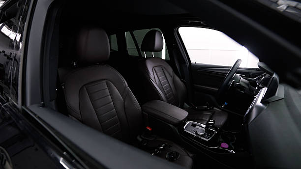 istock Modern car interior showing leather seats and steering wheel 2229793427
