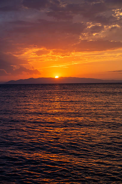 istock Beautiful sunset over the lake and mountains. 2229794611