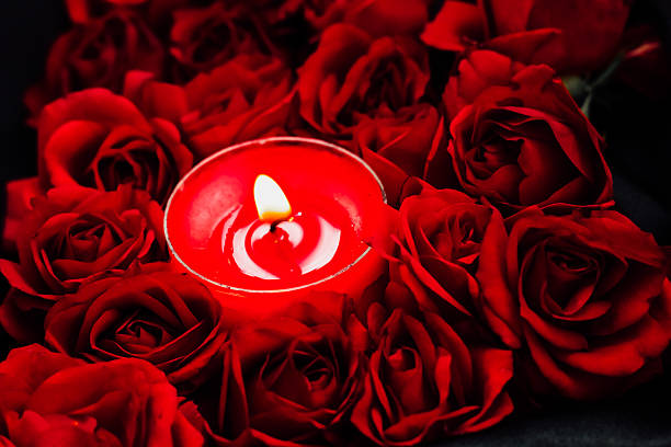 istock Romantic candle with red roses creating an intimate atmosphere for a special occasion 2229799295