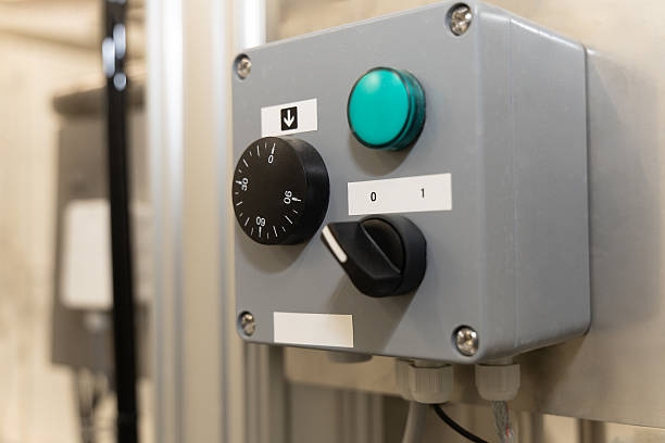istock electric panel box with speed control, green light and rotary switch, in an abattoir, industrial systems 2229802645