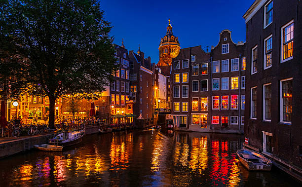 istock Westerkerk (Western Church), with canal view in Amsterdam. Netherlands. 2229807925