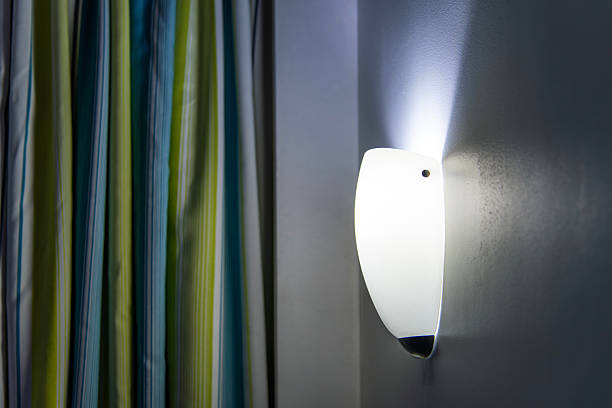 istock curtain and wall lamp in the hotel room 2229809885