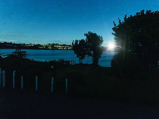 istock Moonlit peace by the water 2229810217