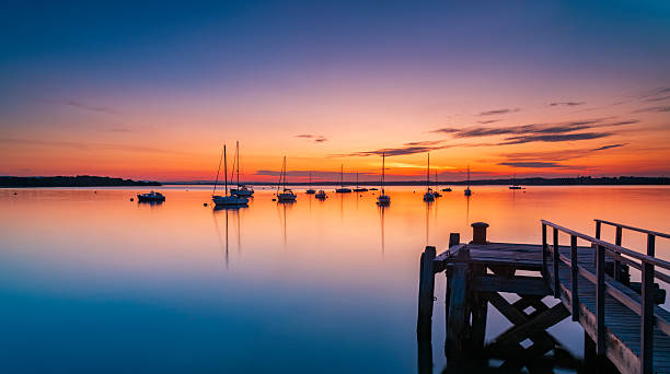 istock Sunset over Poole Harbour at Hamworthy pier 2229818342