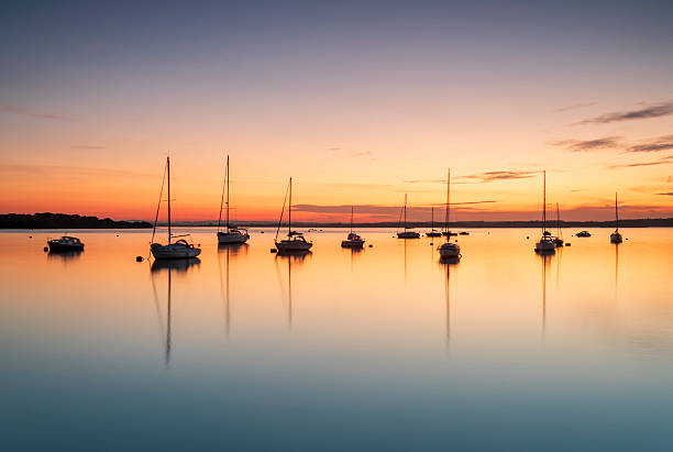 istock Sunset over Poole Harbour at Hamworthy pier 2229818355