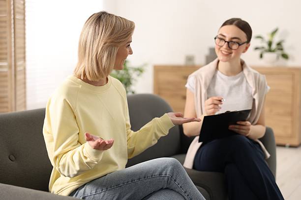istock Professional psychotherapist working with on sofa patient in office 2229827188