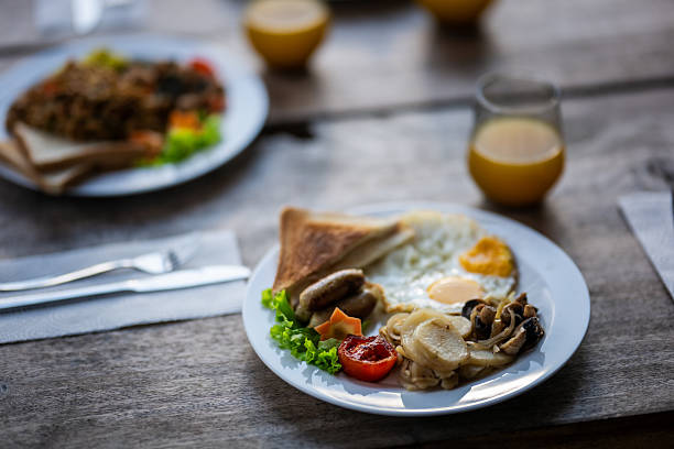 A cozy breakfast scene on a wooden table at home.