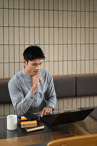 istock Thoughtful Asian businessman analyzing information on his laptop 2229838861