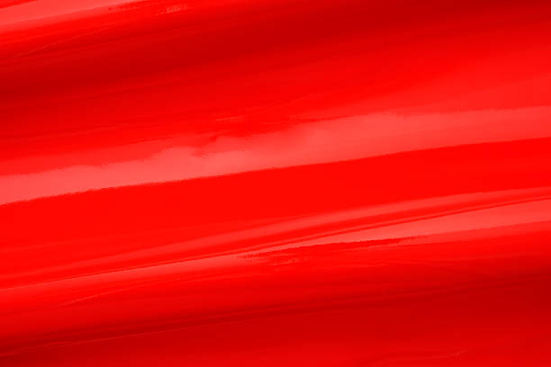 istock Abstract background of red shiny vinyl wave 2229850806