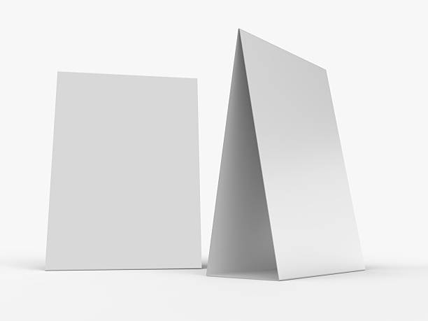 istock 3D realistic mockup of a blank table sign tent card A4 format, isolated on white. Minimal display Ideal for menu, restaurant, cafe, event, promotion, branding, ads, and marketing design presentations 2229851745