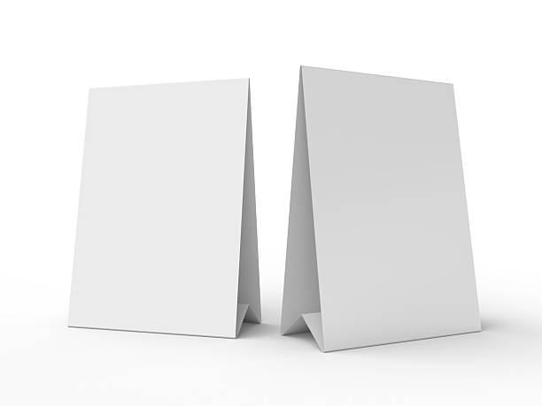 istock 3D realistic mockup of a blank table sign tent card A4 format, isolated on white. Minimal display Ideal for menu, restaurant, cafe, event, promotion, branding, ads, and marketing design presentations 2229851750