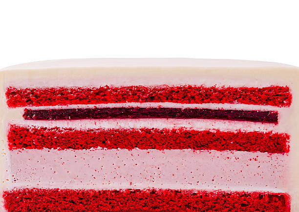 istock Brightly layered red velvet cake with cream frosting on a clean surface 2229853030