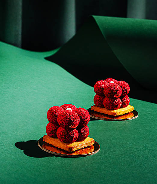 istock Exquisite desserts showcased on a vibrant green background with texture 2229853805