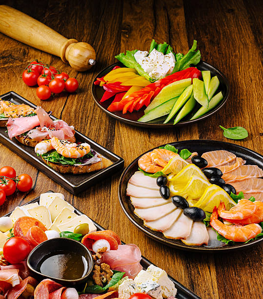istock Delicious gourmet appetizer platter displayed on rustic wooden table 2229854414