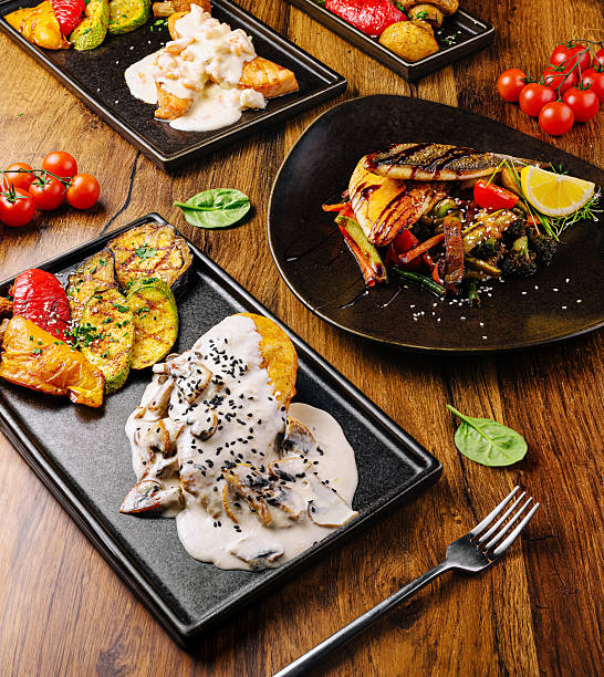 istock Delicious gourmet dishes served on elegant black plates at a modern restaurant 2229854819