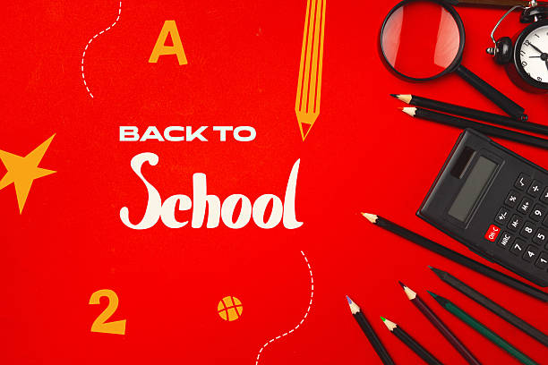 istock Colorful back to school supplies and decorations arranged on a vibrant red background ready for the new school year 2229856592
