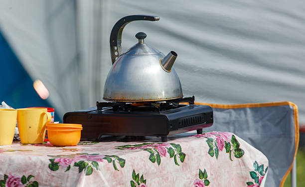 istock A silver tea kettle sits on a stove top burner 2229859309