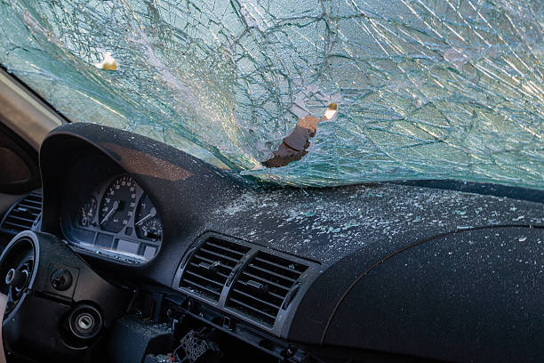 istock damaged windshield, vandalised car window glass 2229862183